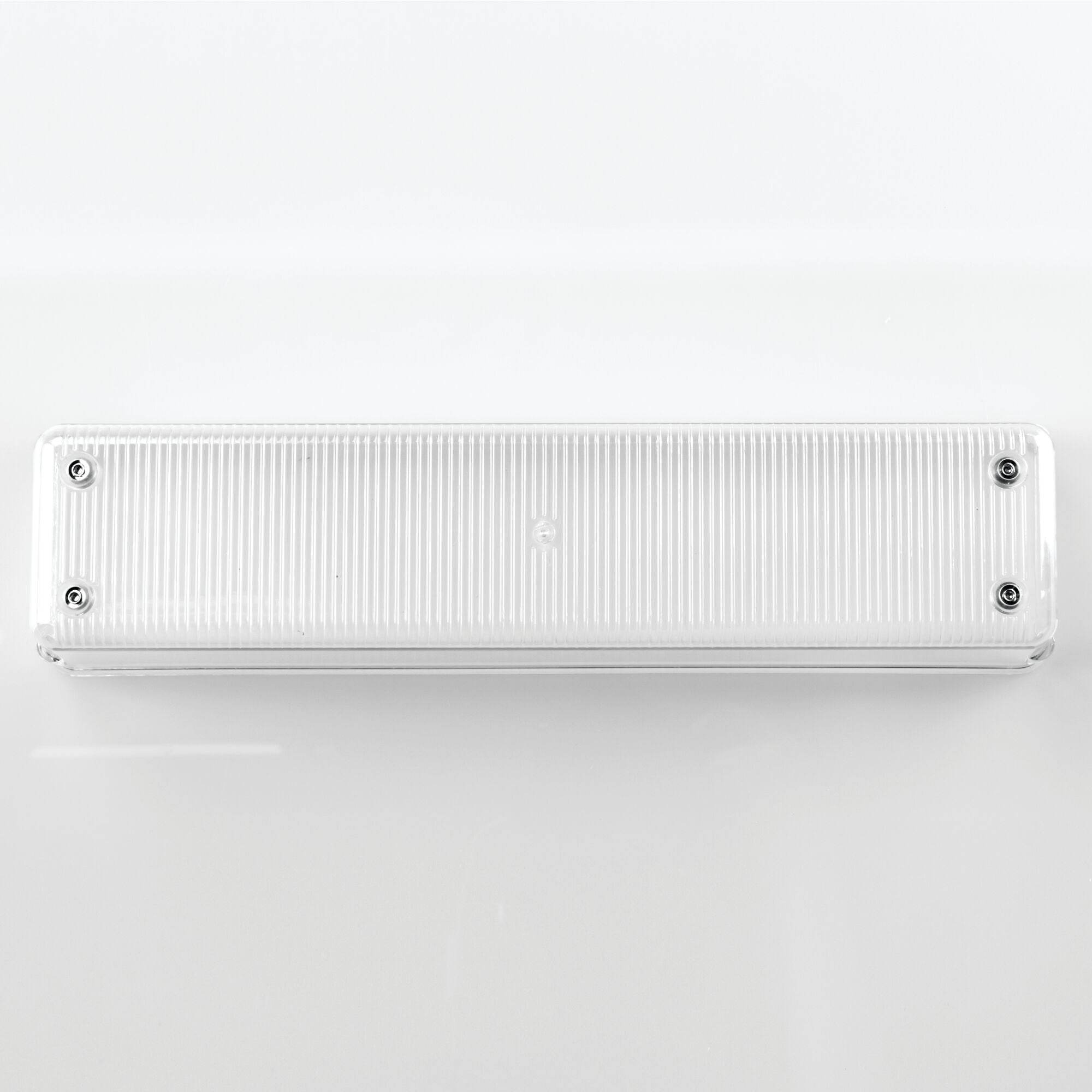 White air conditioning unit on a light gray background