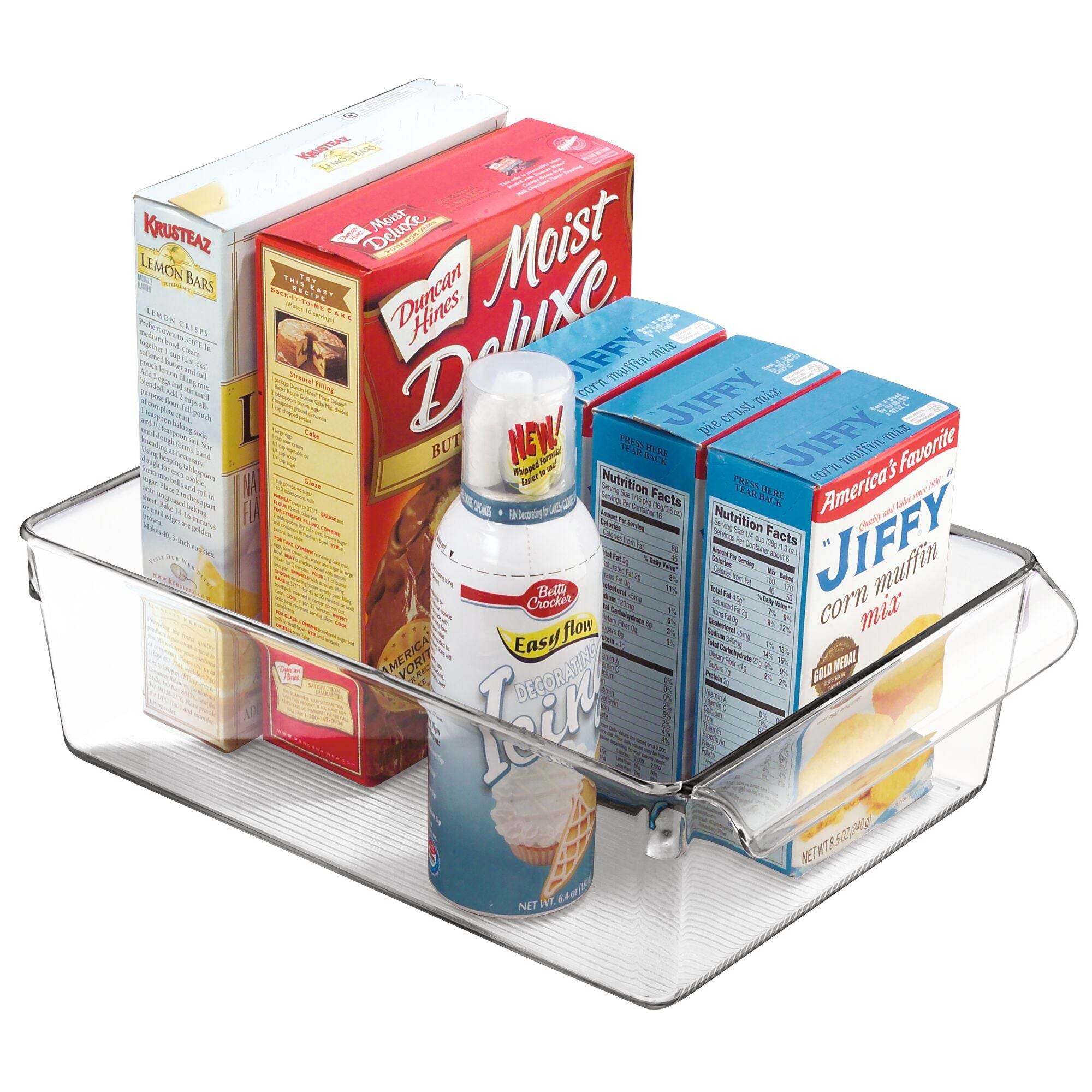 iDesign Clear plastic organizer with baking supplies including Jiffy mix boxes and a bottle on a white background