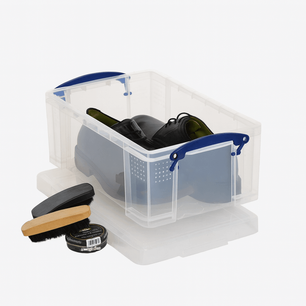 Really Useful Box 9 Litre Clear storage box with blue handles containing a black object, surrounded by cleaning tools on a white background.