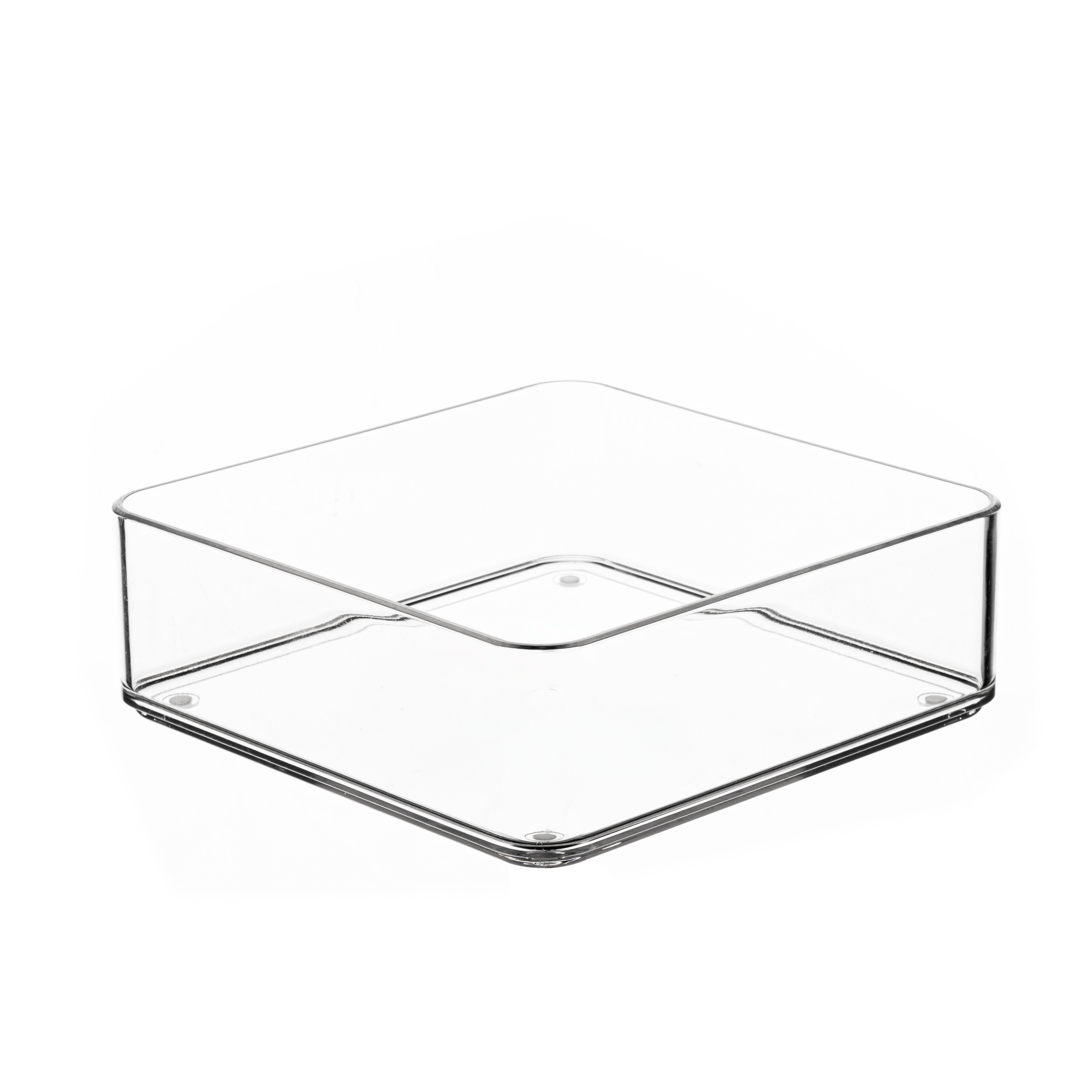 Clear plastic square drawer organiser on a white background