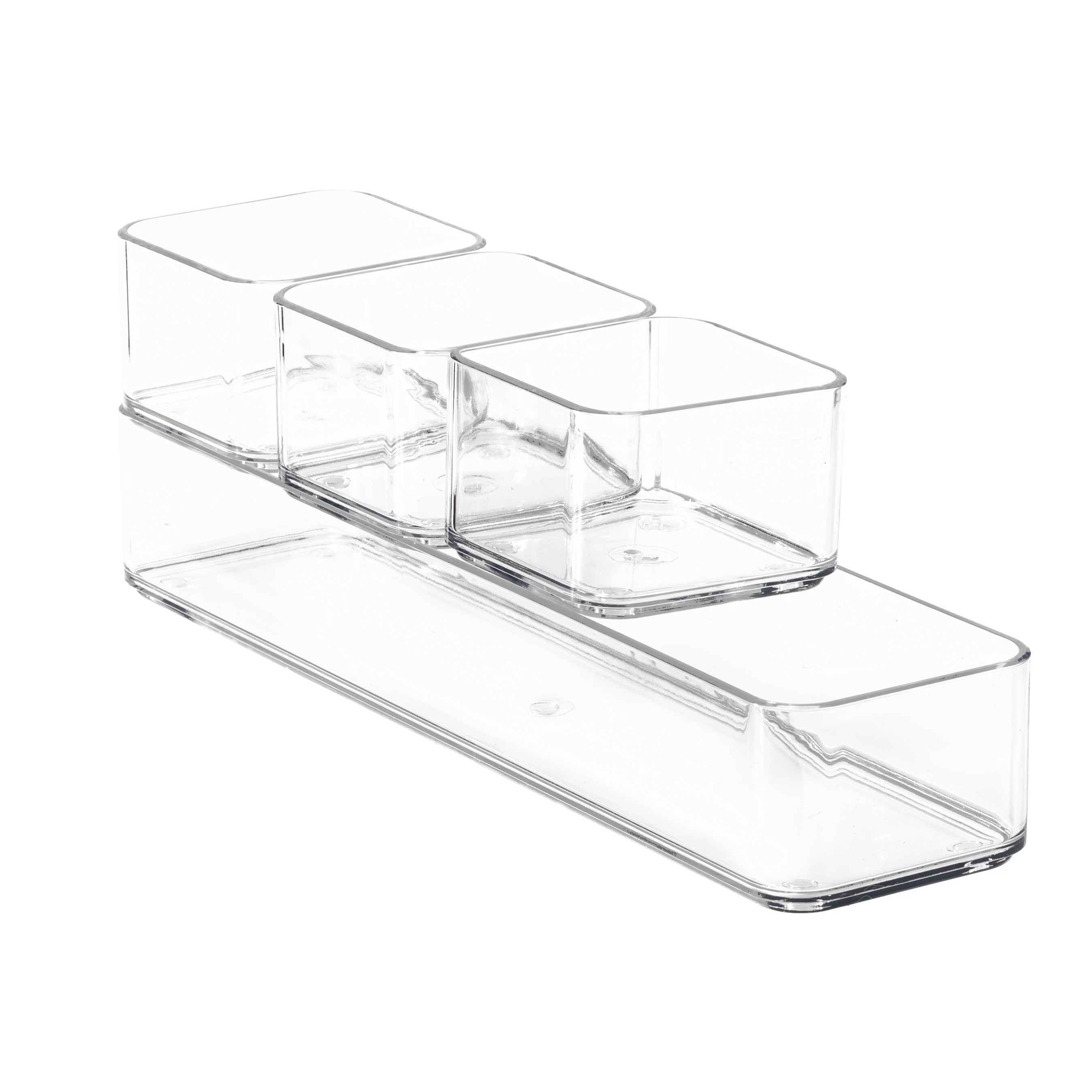 Clear plastic organisers on a white background