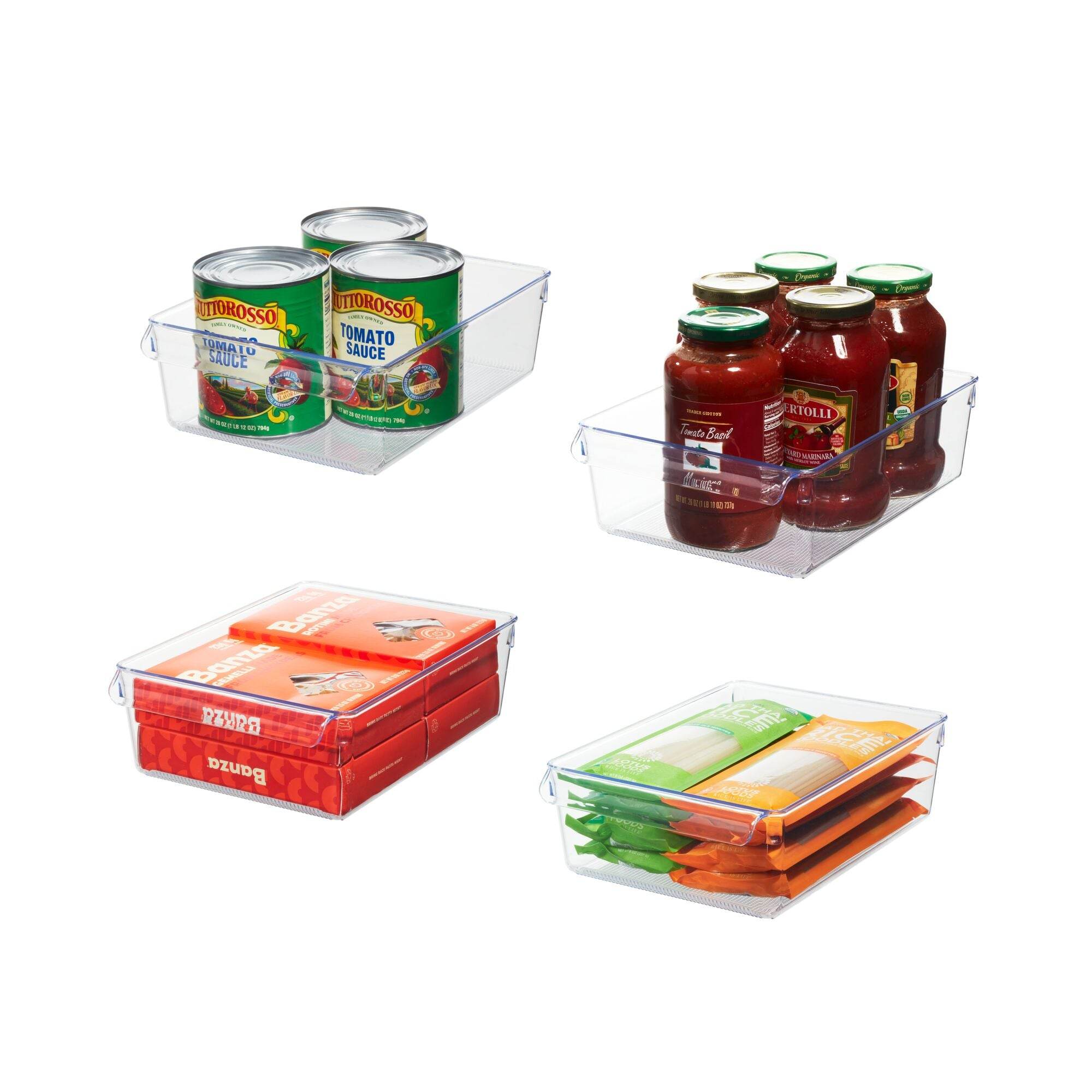 Clear plastic storage bins with canned goods, jars, and boxes on a white background
