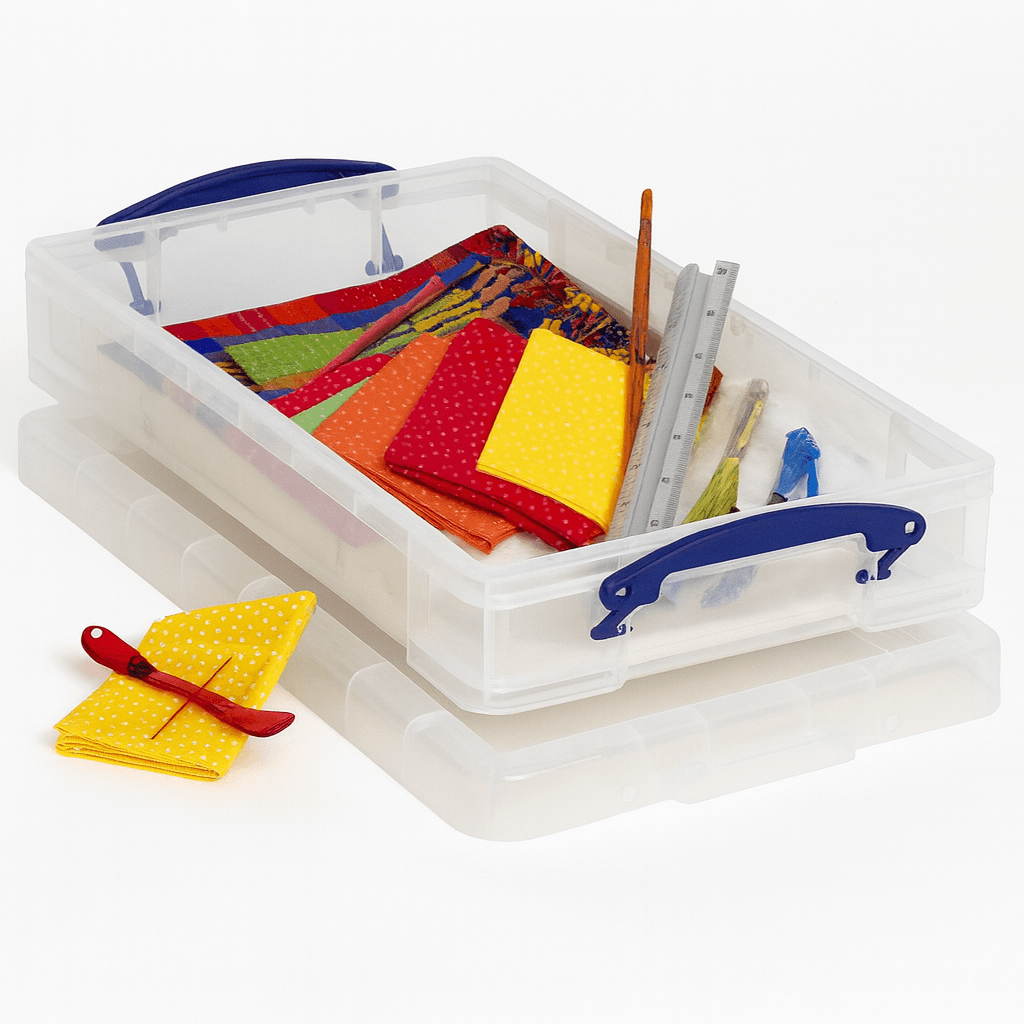 Really useful Box Clear storage box with colorful fabric and tools on a white background