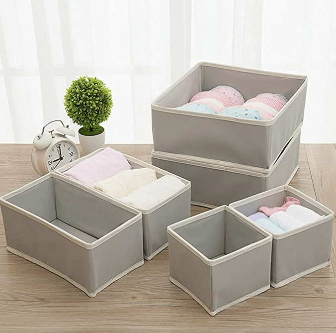6 pack grey and beige organiser filled with clothes