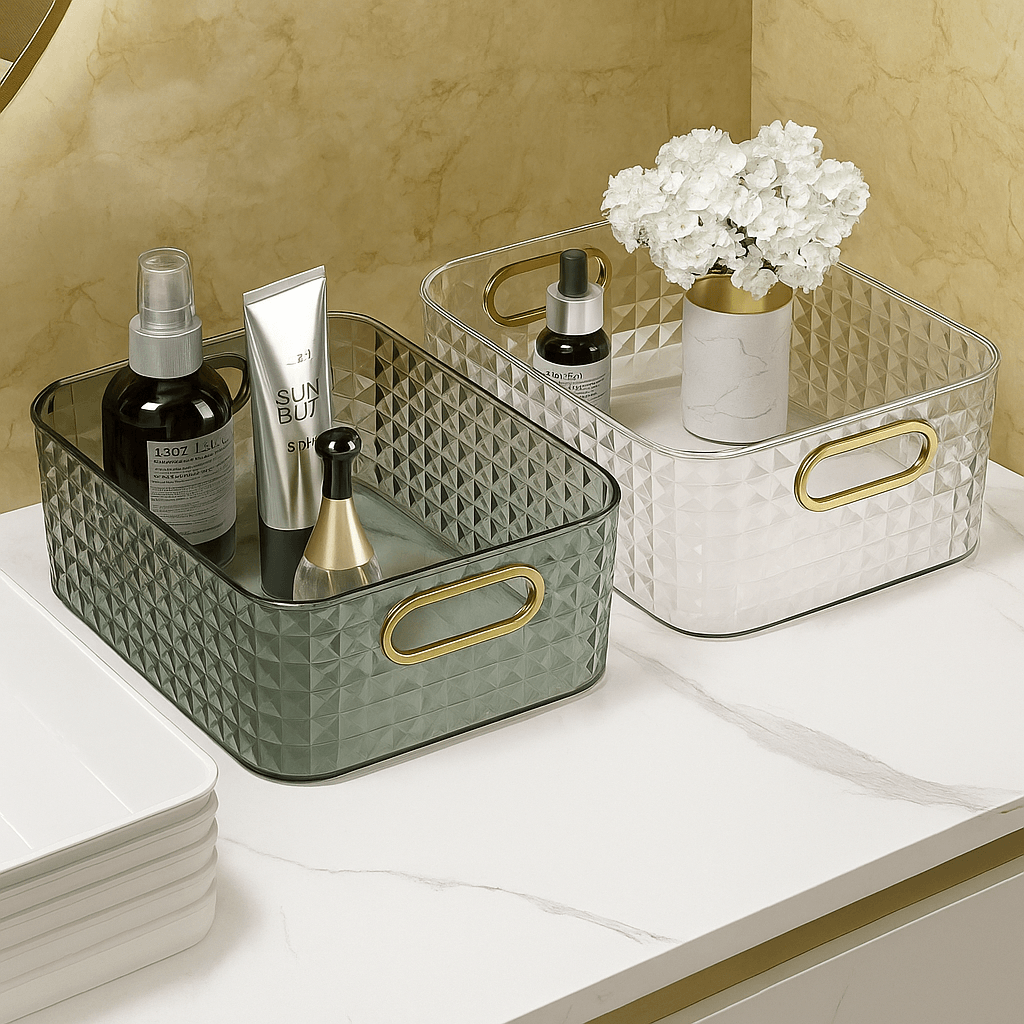 Two decorative trays with gold handles on a surface, one containing skincare products and the other with a small plant.