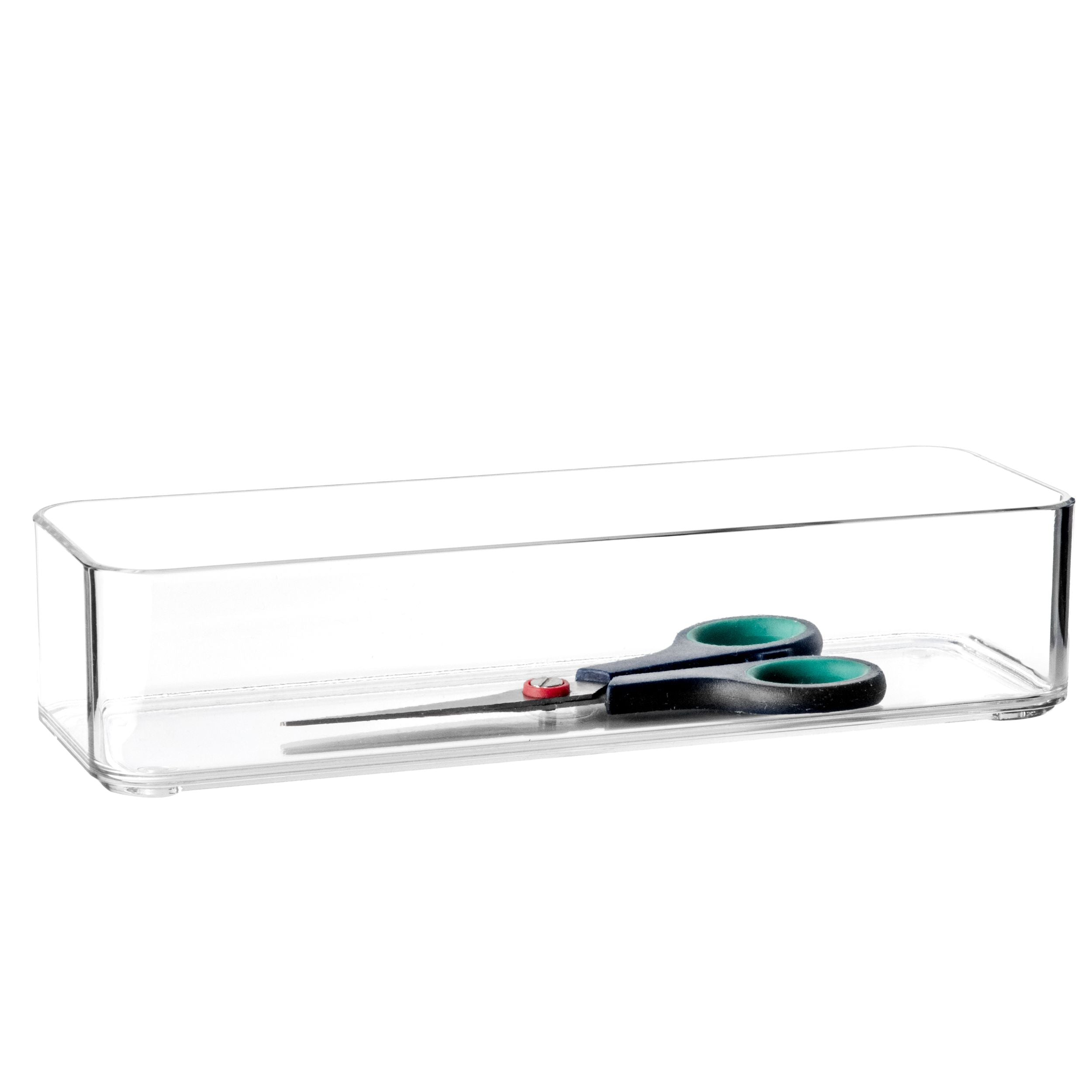 Clear plastic container with a pair of scissors on a white background