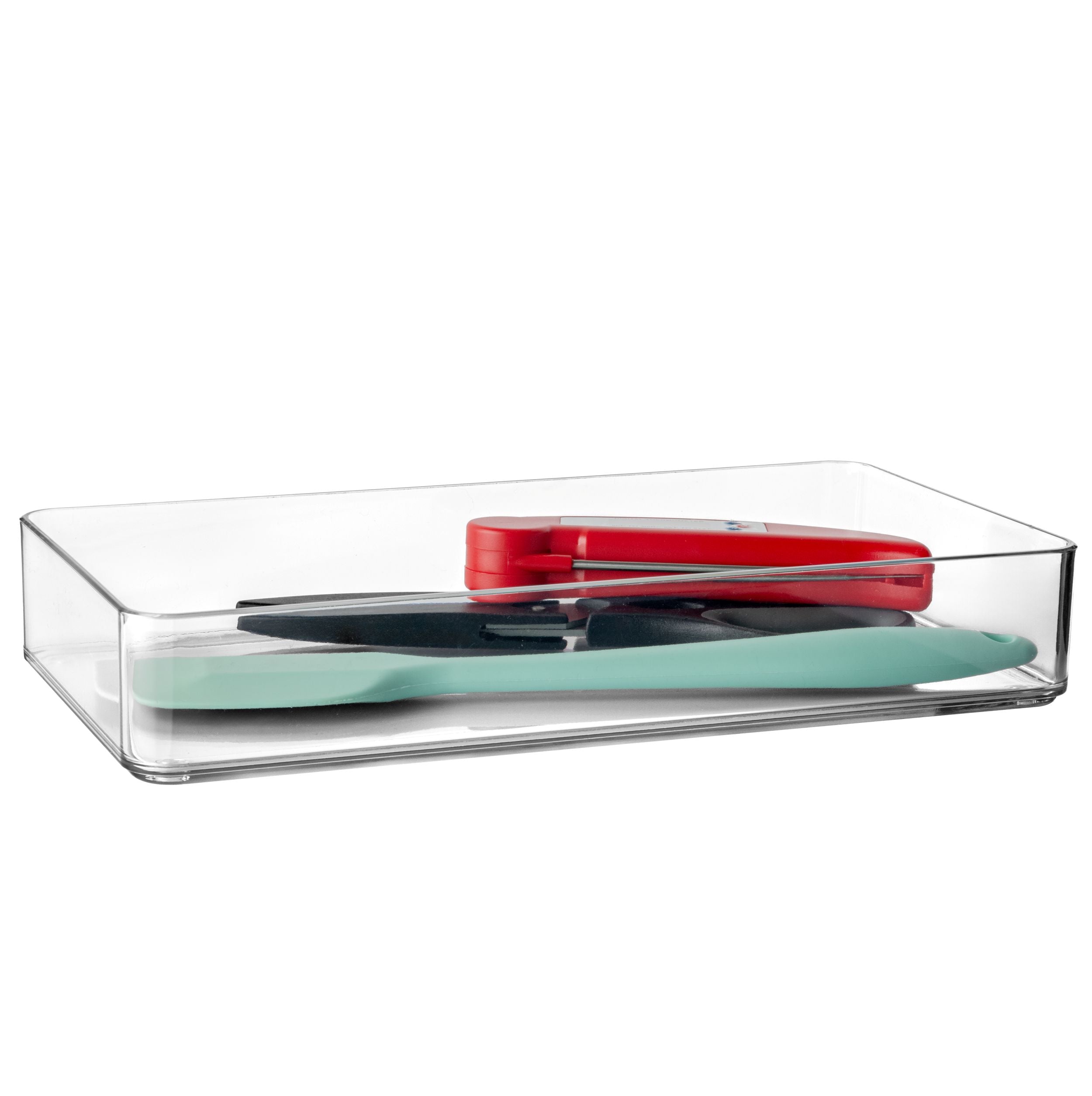 Clear rectangular drawer organiser with red and green items on a white background