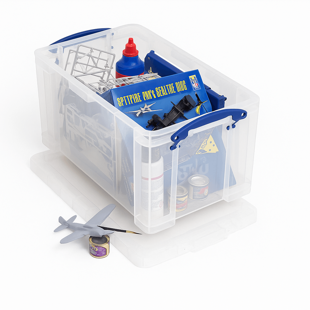 Really Useful Box 24 Litre Clear plastic storage box with model building supplies on a white background