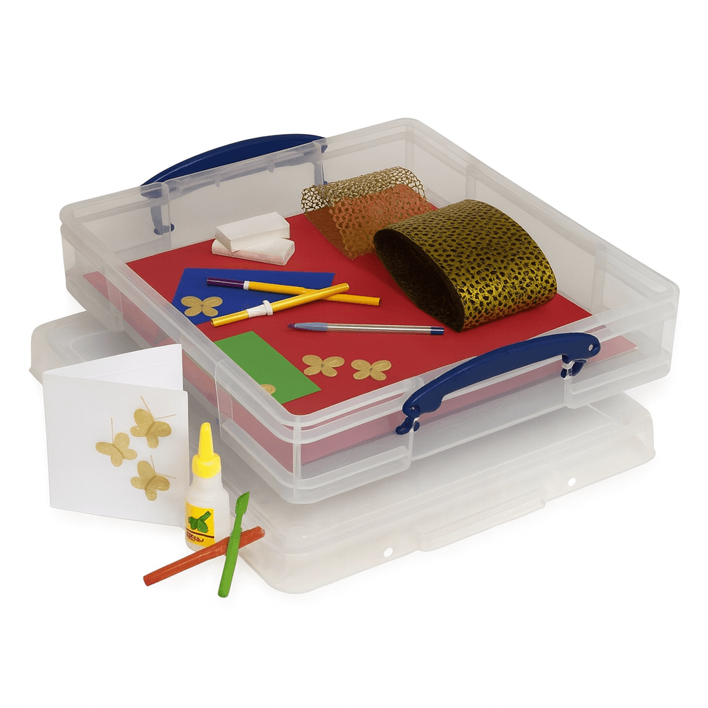 Really Useful Box 7 Litre Scrapbook Clear plastic storage box with art supplies including paper, markers, and paint on a white background