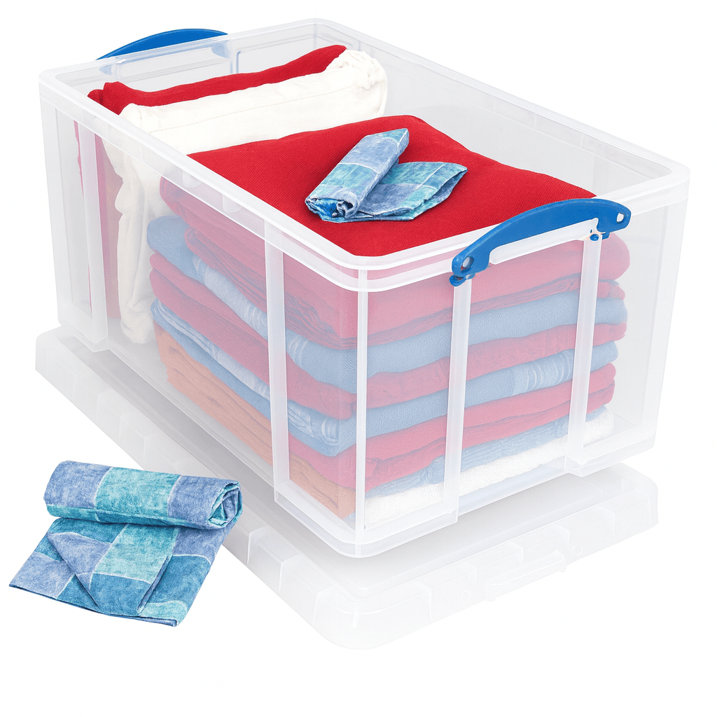 Really useful Box 84 Litre Clear storage box with colorful towels on a white background